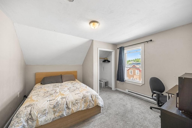 150 Belmont St, Worcester, MA 01605 - carpeted bedroom featuring a baseboard heating unit, a desk, and a wall mounted air conditioner
