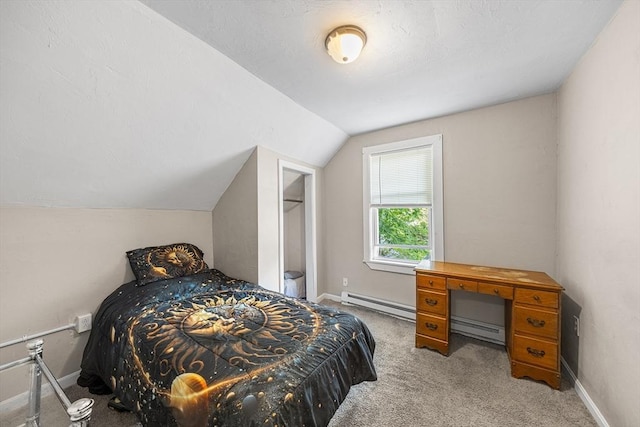 150 Belmont St, Worcester, MA 01605 - bedroom with a baseboard heating unit, a baseboard radiator, carpet, vaulted ceiling, and baseboards
