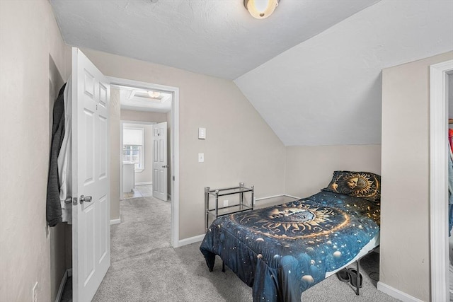 150 Belmont St, Worcester, MA 01605 - carpeted bedroom featuring lofted ceiling and baseboards