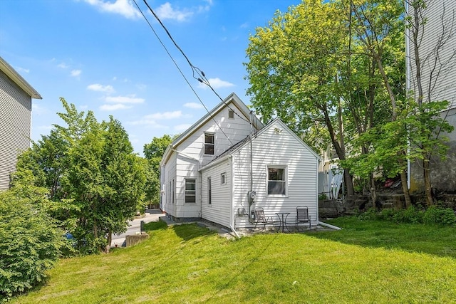 150 Belmont St, Worcester, MA 01605 - rear view of property with a lawn