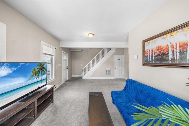 150 Belmont St, Worcester, MA 01605 - living area featuring stairway, carpet flooring, and baseboards