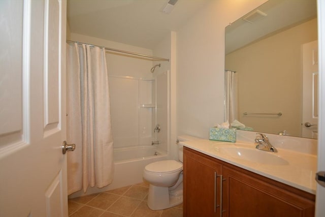 full bathroom with tile patterned flooring, vanity, shower / tub combo, and toilet