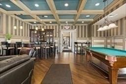 recreation room with beamed ceiling, dark hardwood / wood-style floors, billiards, and coffered ceiling