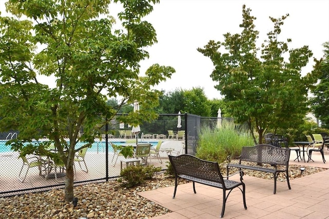 view of patio / terrace featuring a community pool