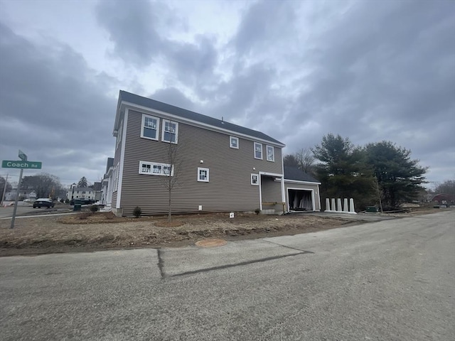 exterior space with a garage