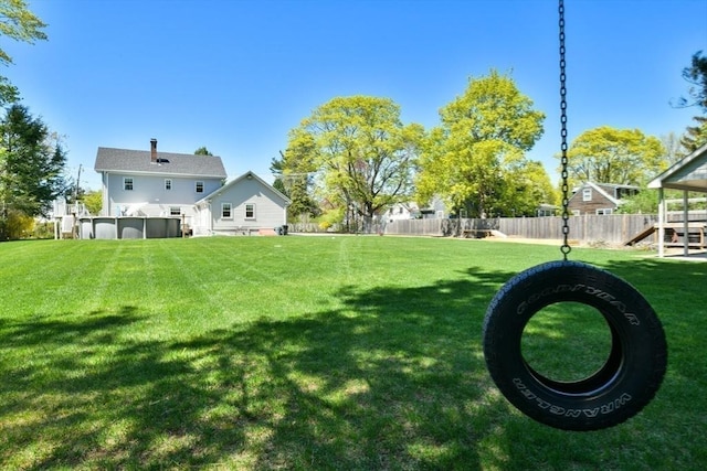 view of yard with fence