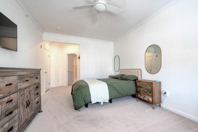 bedroom with a ceiling fan, light carpet, crown molding, and baseboards