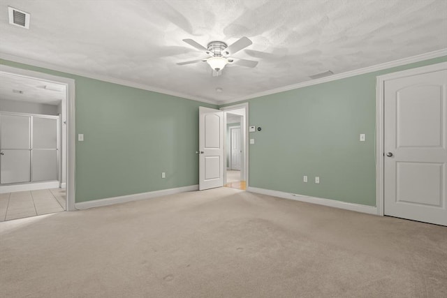 41 Winter Ln Unit 41, Tewksbury, MA 01876 - unfurnished bedroom featuring light colored carpet, baseboards, ensuite bathroom, crown molding, and a ceiling fan