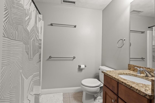 41 Winter Ln Unit 41, Tewksbury, MA 01876 - bathroom featuring vanity, toilet, tile patterned floors, a shower with curtain, and baseboards