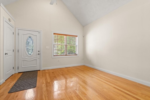41 Winter Ln Unit 41, Tewksbury, MA 01876 - entryway with light wood finished floors, high vaulted ceiling, baseboards, and ceiling fan