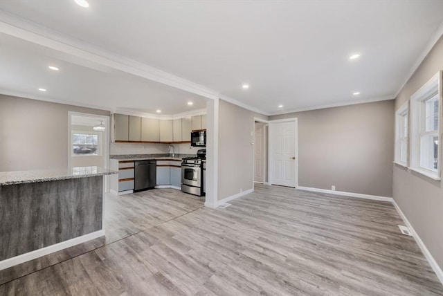 kitchen featuring black appliances, light stone countertops, crown molding, and light hardwood / wood-style floors