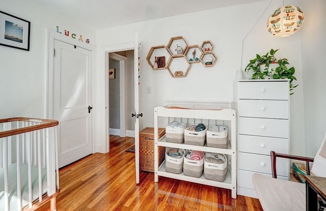 bedroom featuring wood finished floors