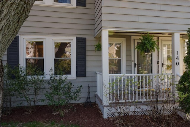 entrance to property with covered porch
