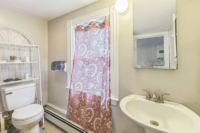 bathroom with a sink, curtained shower, toilet, and a baseboard radiator