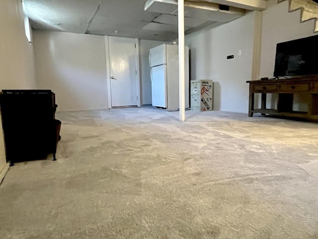 16 Douglas Ave, Beverly, MA 01915 - below grade area with freestanding refrigerator and light carpet