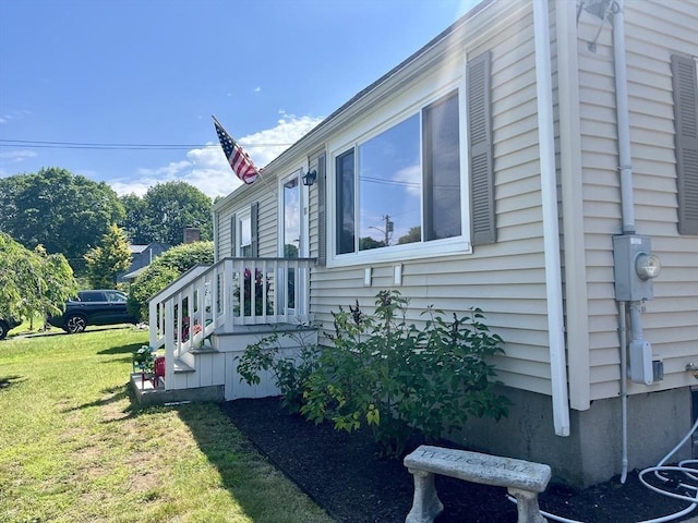 16 Douglas Ave, Beverly, MA 01915 - view of property exterior with a lawn