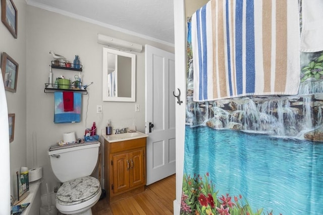 51 Prospect St, Webster, MA 01570 - bathroom featuring wood finished floors, crown molding, toilet, and vanity