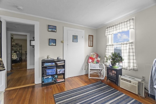 51 Prospect St, Webster, MA 01570 - sitting room with wood finished floors, crown molding, and an AC wall unit