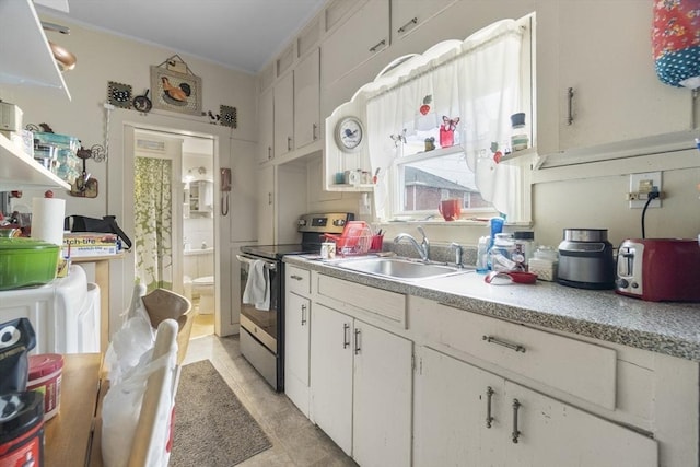 51 Prospect St, Webster, MA 01570 - kitchen with electric stove, a sink, light countertops, white cabinetry, and crown molding