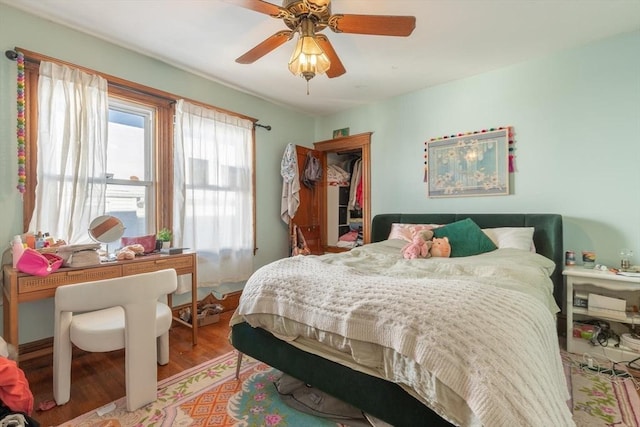 bedroom featuring ceiling fan and light hardwood / wood-style flooring