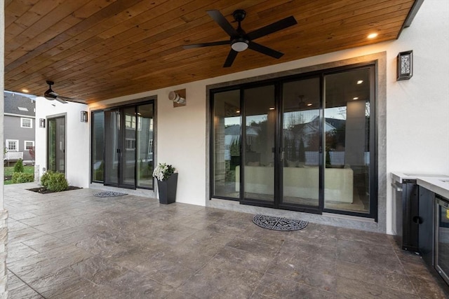 view of patio featuring ceiling fan