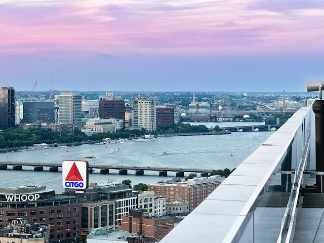 property's view of city featuring a water view