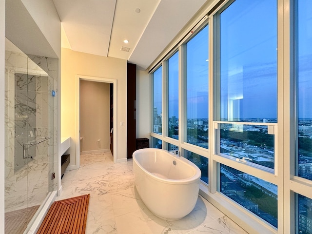 bathroom featuring plus walk in shower