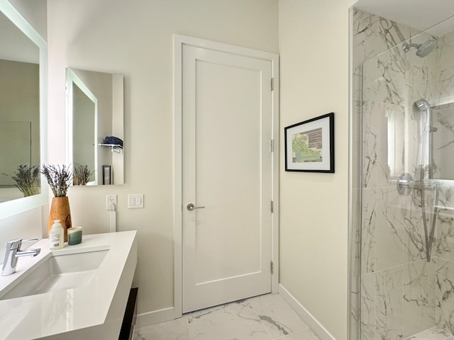 bathroom featuring vanity and a tile shower