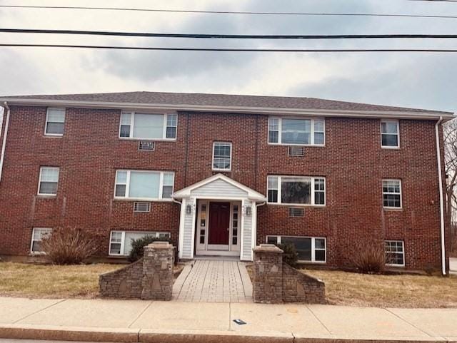 multi unit property with brick siding