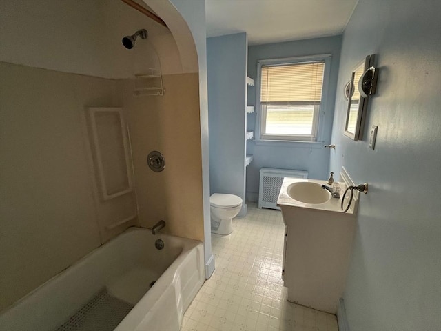 189 Bush St, Fall River, MA 02724 - full bath featuring radiator, toilet, tile patterned floors, tub / shower combination, and vanity