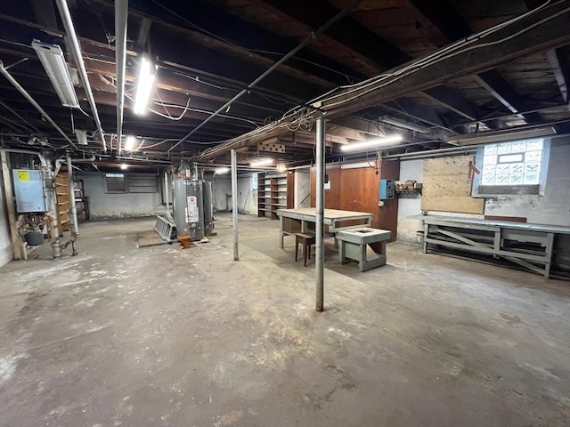 189 Bush St, Fall River, MA 02724 - basement featuring water heater and stairs
