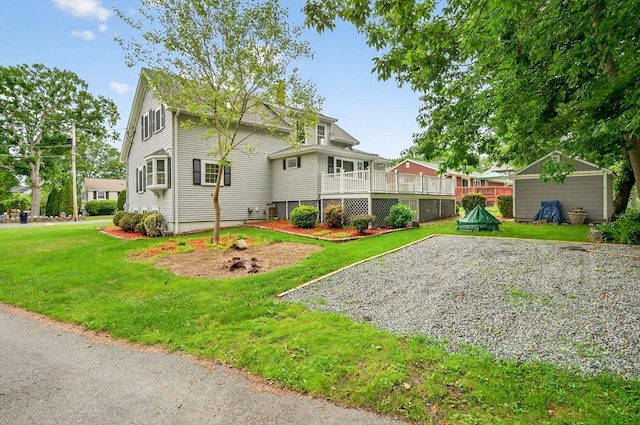 70 Hancock St, Whitman, MA 02382 - rear view of property featuring a lawn