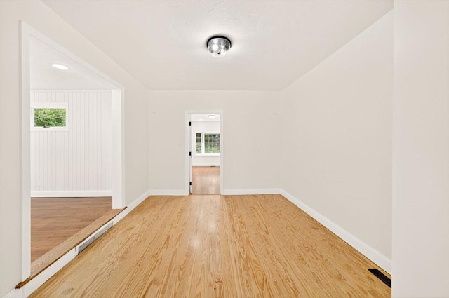 70 Hancock St, Whitman, MA 02382 - spare room featuring healthy amount of natural light and wood finished floors
