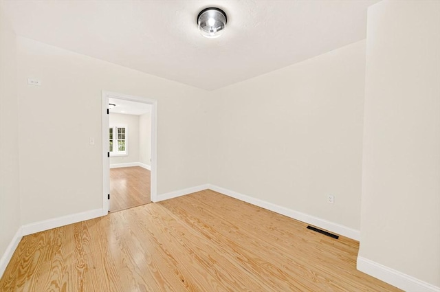 70 Hancock St, Whitman, MA 02382 - spare room featuring light wood-style floors and baseboards