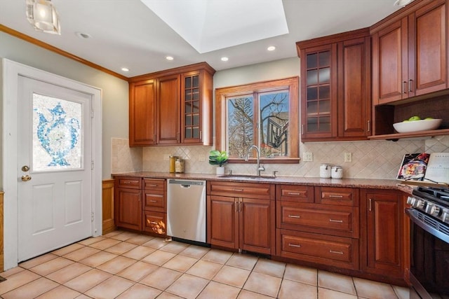 kitchen with a sink, stone countertops, stainless steel dishwasher, gas stove, and decorative backsplash