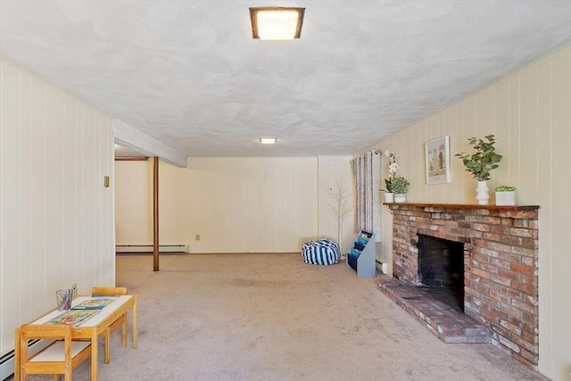 21 Johnson Rd, Winchester, MA 01890 - finished below grade area featuring a baseboard heating unit, carpet flooring, a fireplace, wood walls, and a baseboard radiator
