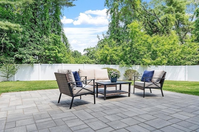 21 Johnson Rd, Winchester, MA 01890 - fenced backyard with a patio and outdoor lounge area