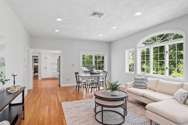 21 Johnson Rd, Winchester, MA 01890 - living area featuring recessed lighting, light wood-style flooring, and baseboards