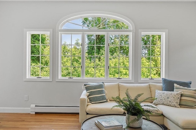 21 Johnson Rd, Winchester, MA 01890 - sunroom featuring a baseboard heating unit