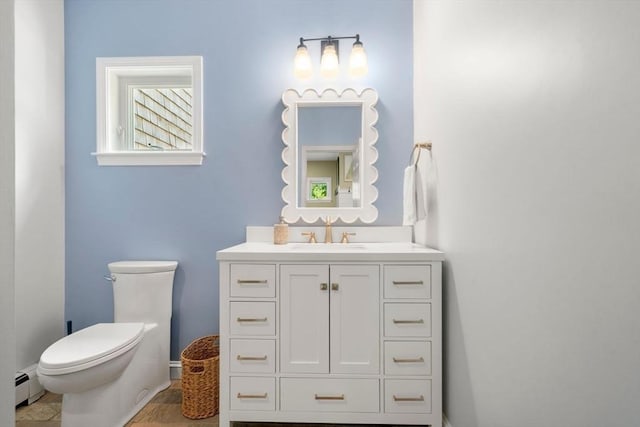 172 Carolyn Cir, Marshfield, MA 02050 - bathroom featuring baseboard heating and vanity