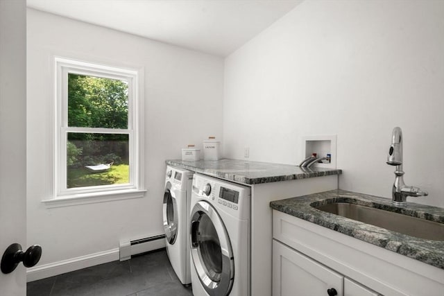 172 Carolyn Cir, Marshfield, MA 02050 - laundry room with baseboard heating, washer and dryer, and dark tile patterned floors