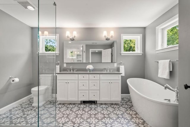 172 Carolyn Cir, Marshfield, MA 02050 - full bath featuring double vanity, a soaking tub, a shower with shower door, and tile patterned floors