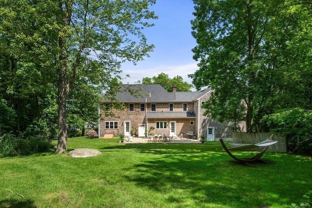 172 Carolyn Cir, Marshfield, MA 02050 - rear view of property with a patio area and a yard