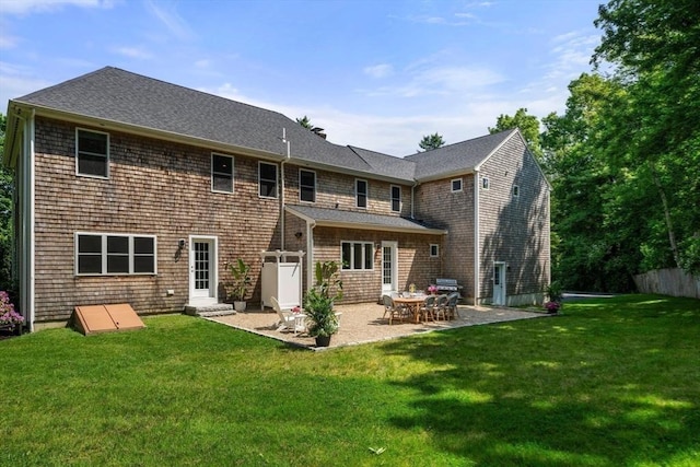 172 Carolyn Cir, Marshfield, MA 02050 - rear view of house with a patio and a shingled roof