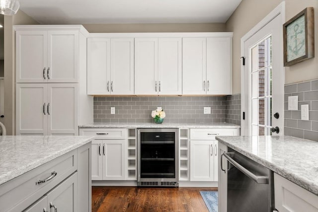 172 Carolyn Cir, Marshfield, MA 02050 - kitchen with beverage cooler, white cabinets, and stainless steel dishwasher