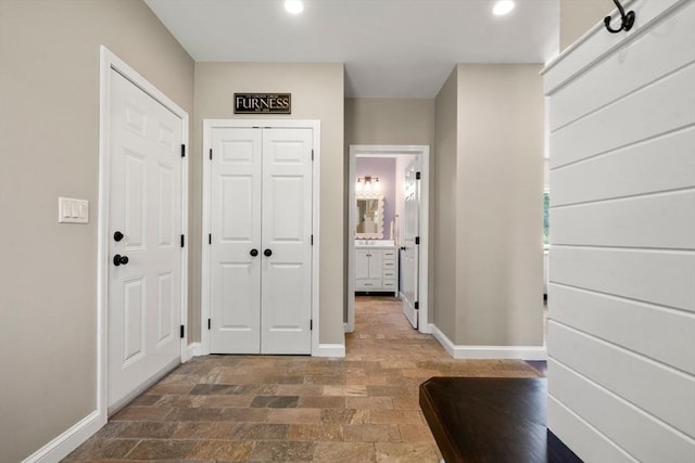 172 Carolyn Cir, Marshfield, MA 02050 - entrance foyer featuring recessed lighting and dark stone finish flooring