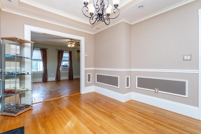 13 Mullin Ave, Quincy, MA 02169 - unfurnished room featuring wood finished floors, a chandelier, cooling unit, crown molding, and ceiling fan