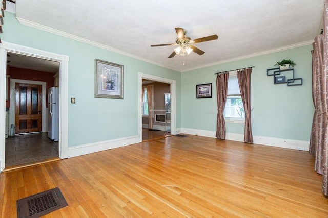 13 Mullin Ave, Quincy, MA 02169 - unfurnished room with a ceiling fan, wood finished floors, and ornamental molding
