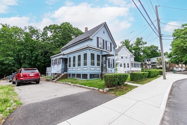 13 Mullin Ave, Quincy, MA 02169 - view of front of home featuring a chimney