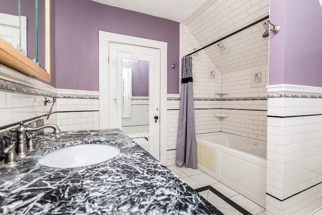 13 Mullin Ave, Quincy, MA 02169 - full bathroom featuring tile walls, shower / bath combo, tile patterned floors, vanity, and a wainscoted wall